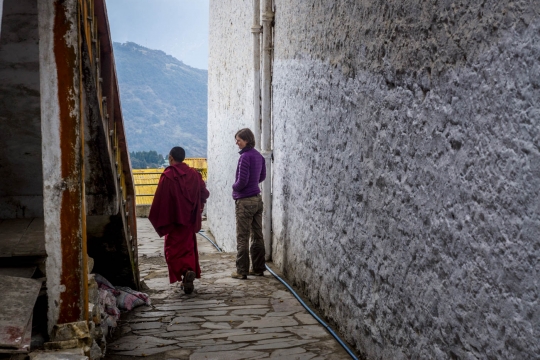 Walking through monastery alleys