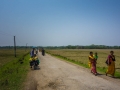 Roads through countryside with beautiful dressed women
