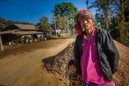 Hill tribe man with daughter