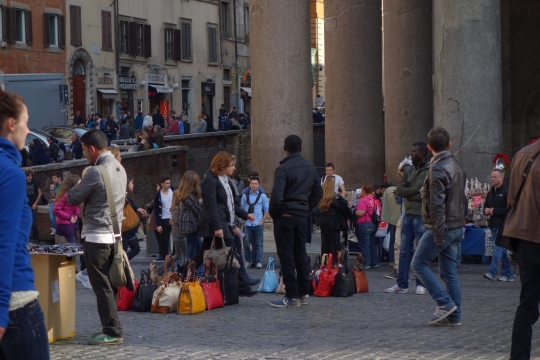 Outside Pantheon street vendors selling bags