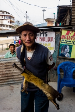 Local man with intresting hat and knife