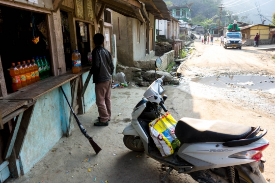 Tamen village resting the gun