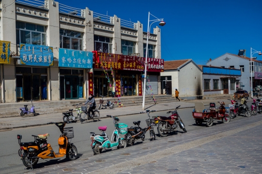 Electrical scooters in front of supermarket