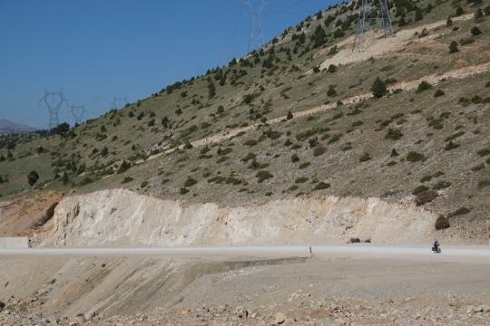 Cycling up steep gravel road