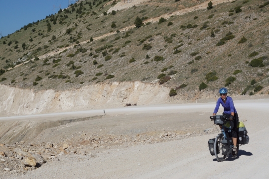Cycling up steep gravel road