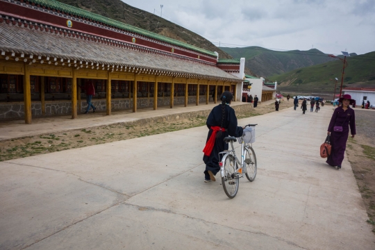 Tibetan girl with bike