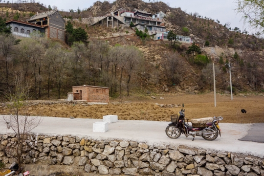 Old temple and motorbike