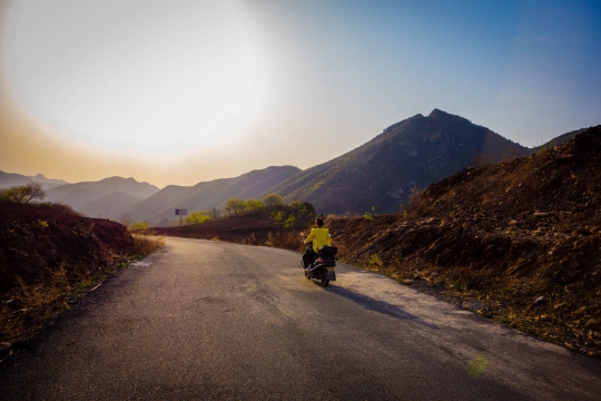 Meeting a modern scooter in between villages