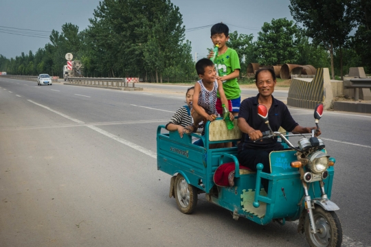 Happy family on the road