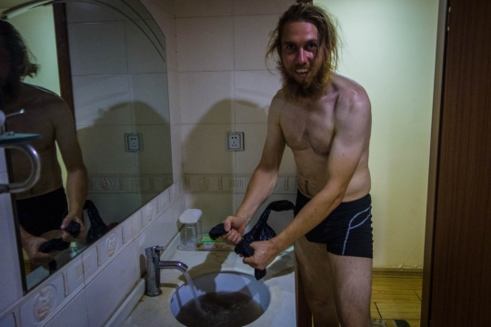Washing our clothes at a small hotel