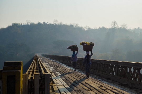 Women on the bridge near Gangaw