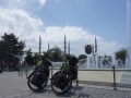 Mojo and Isaba with blue mosque