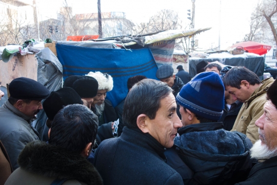 Uighur men playing card games
