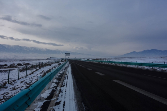 Long straight roads with barriers