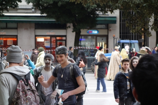 Carnaval in Verona, youngsters throwing eggs and flower