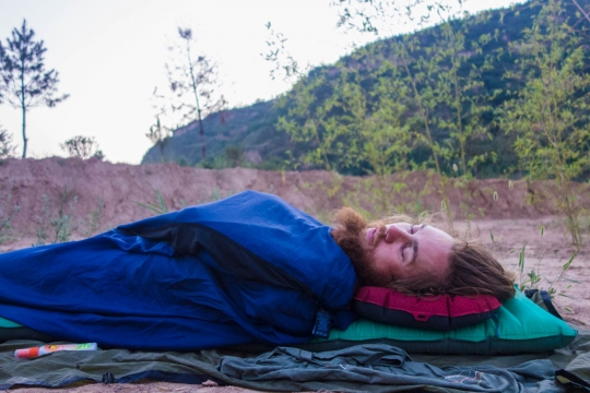 Martin sleeping outside, ground is too warm
