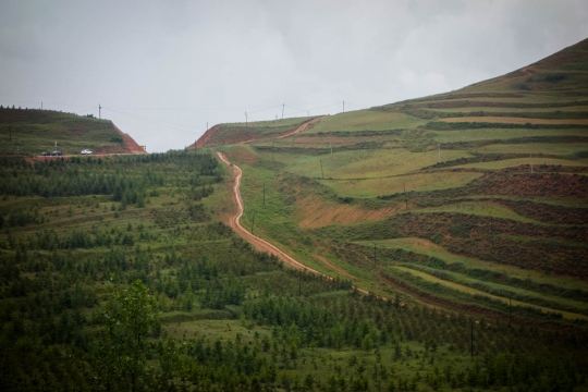 Martin far in the distance on a rough track