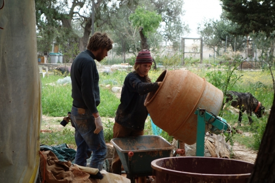 Anna and Martin making the perfect plastering mix