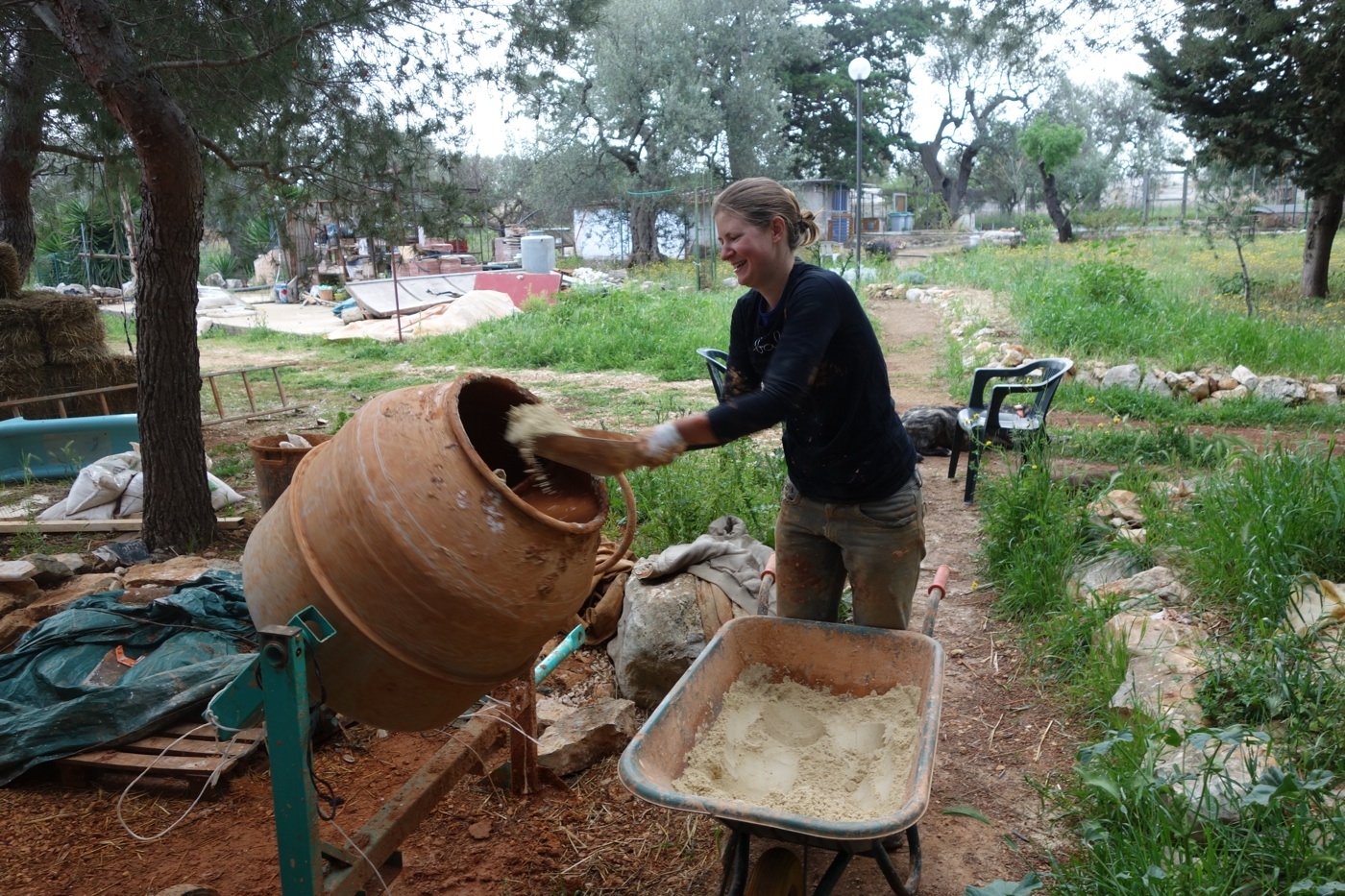 Putting sand into the plastering mix