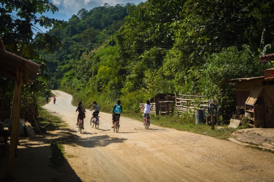 Girls cycling to school
