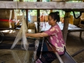 Woman weaving in village