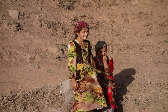 Girls selling pears