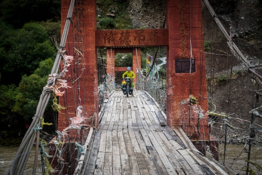 Crossing the river from the village