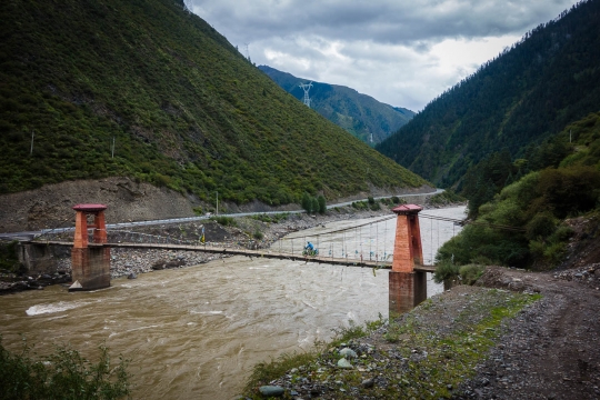 Crossing the river from the village