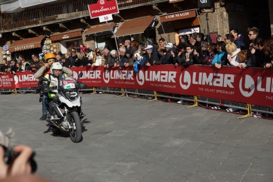 Motorbike before the cyclists