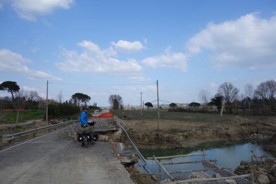 Road washed away by the river