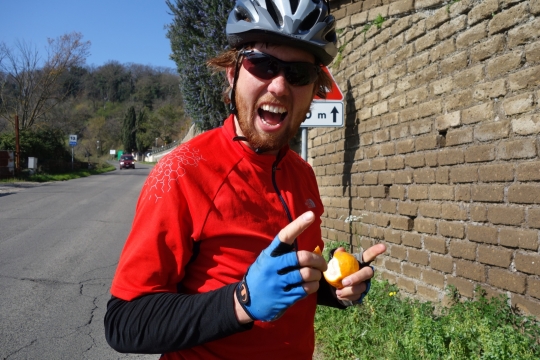 Martin eating a sour and bitter orange