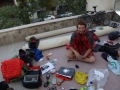 Robin with all his stuff spread out on the rooftop