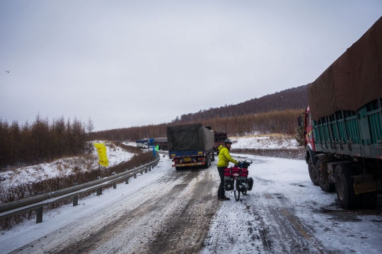 Slippery road and stuck trucks