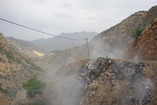 Garbage on fire on road side