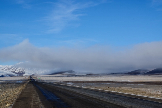 Downhill above the clouds