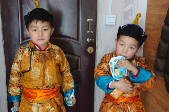 Two cute boys in traditional clothing