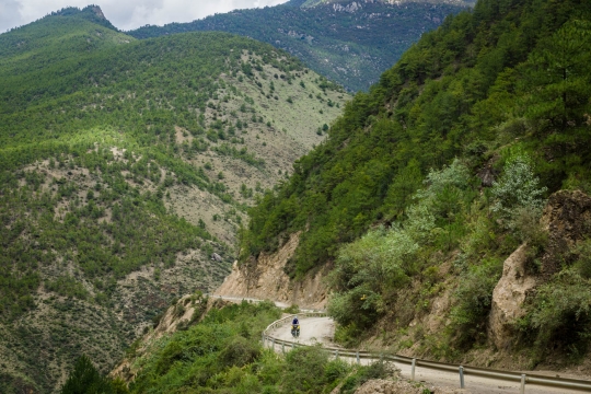 Susanne cycling along the river