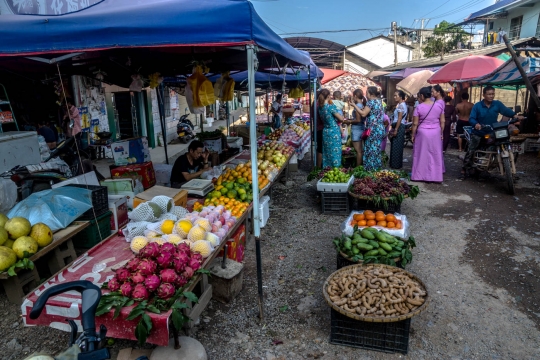 Local market with beautiful women