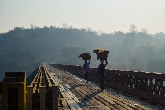 Women on the bridge near Gangaw