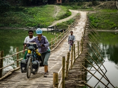 Assam, crossing rivers on bamboo