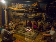 Talking with family around fire place